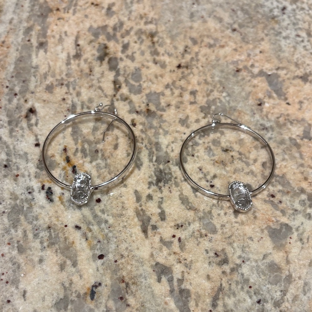 Kendra Scott Silver Hoop Earrings with a stone in the middle